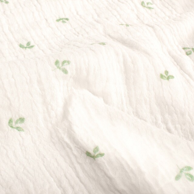 Cotton muslin digital printed leaves offwhite