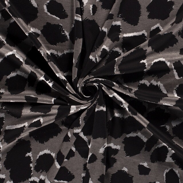 Jersey fabric discharge printed panther light grey