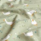 Cotton jersey geese with flowers olive green