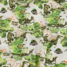 Cotton poplin jurassic park dinos offwhite